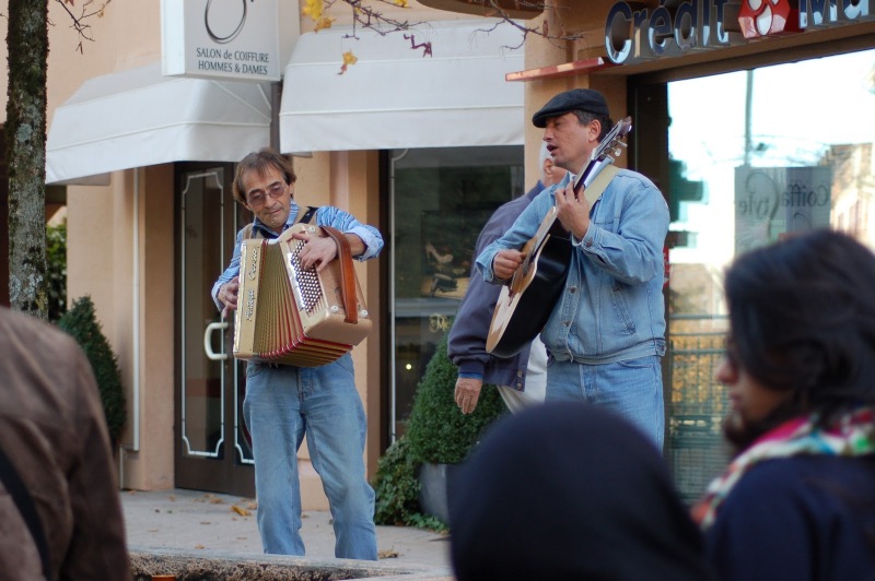 Accordionist and guitarist at street market in Divonne-Les-Bains, France